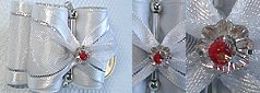 Perle fleur cristal swarovski surmonté d'une petite rocailles. Perles longues et perles métal argent sous le drapé.