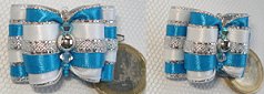 Perle métal argenté, deux toupies swarovski et rocailles.