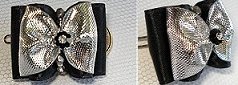 Fleur swarovski surmontée d'une rocaille.