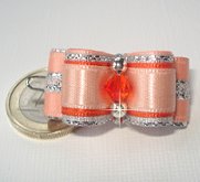 Perle toupie cristal swarovski, deux en métal argent et rocailles.