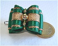 3 perles en métal or et rocailles.
